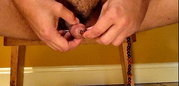  Soloboy Stuffing beads into pee-hole